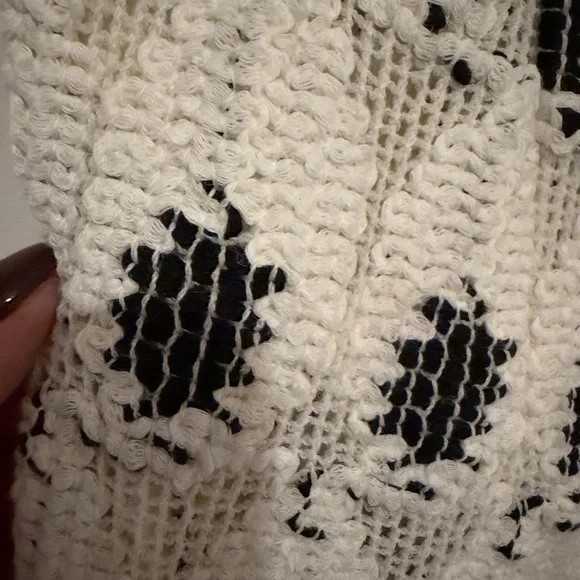 AREA eye crochet knit pants featuring crystal flower applique
